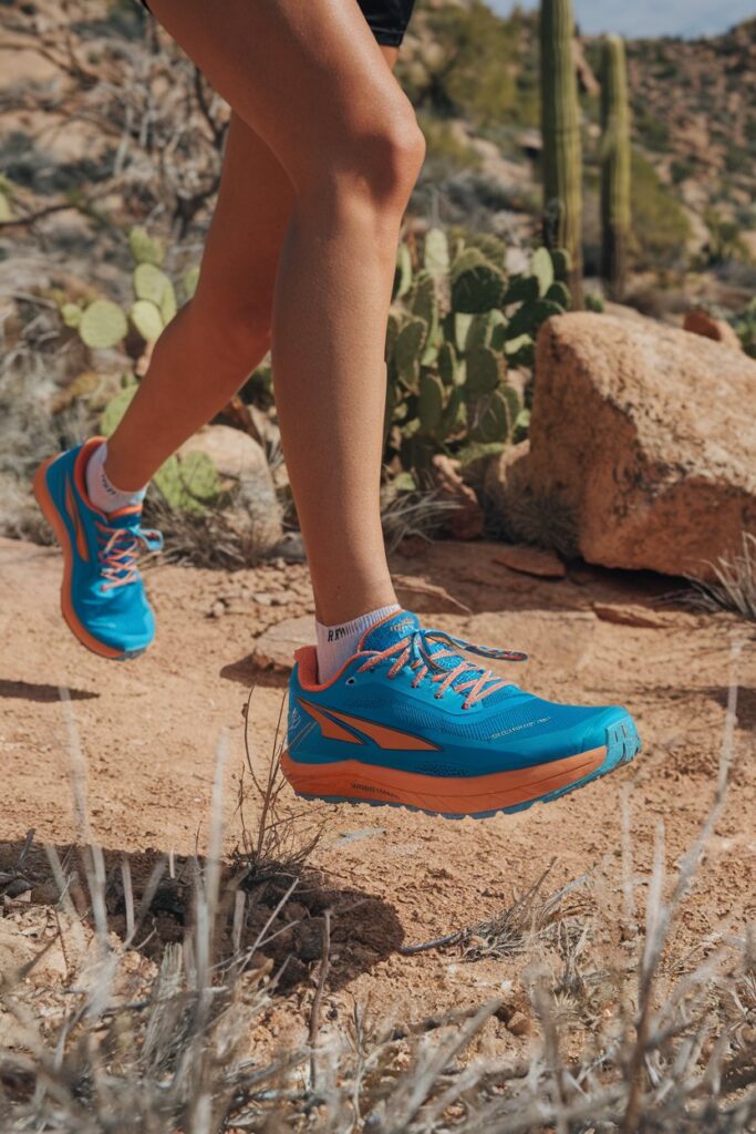 women wear Altra Lone Peak 7