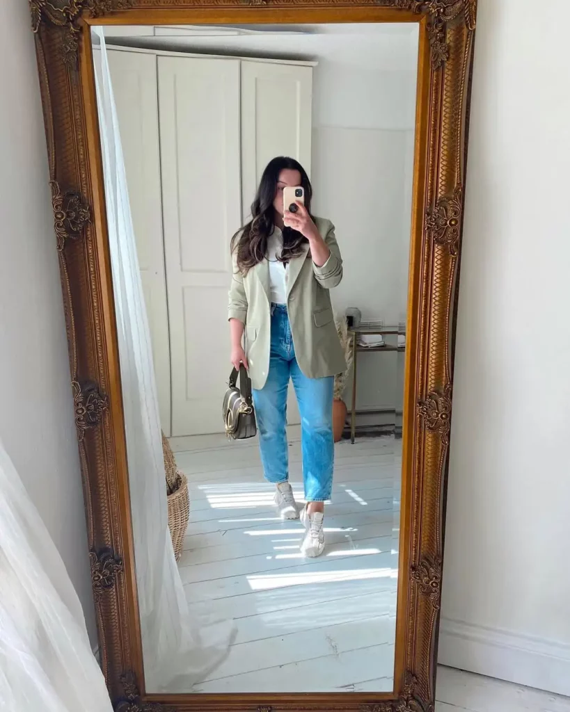 The New Balance 327 sneakers add a sporty finish that still feels intentional and put-together.