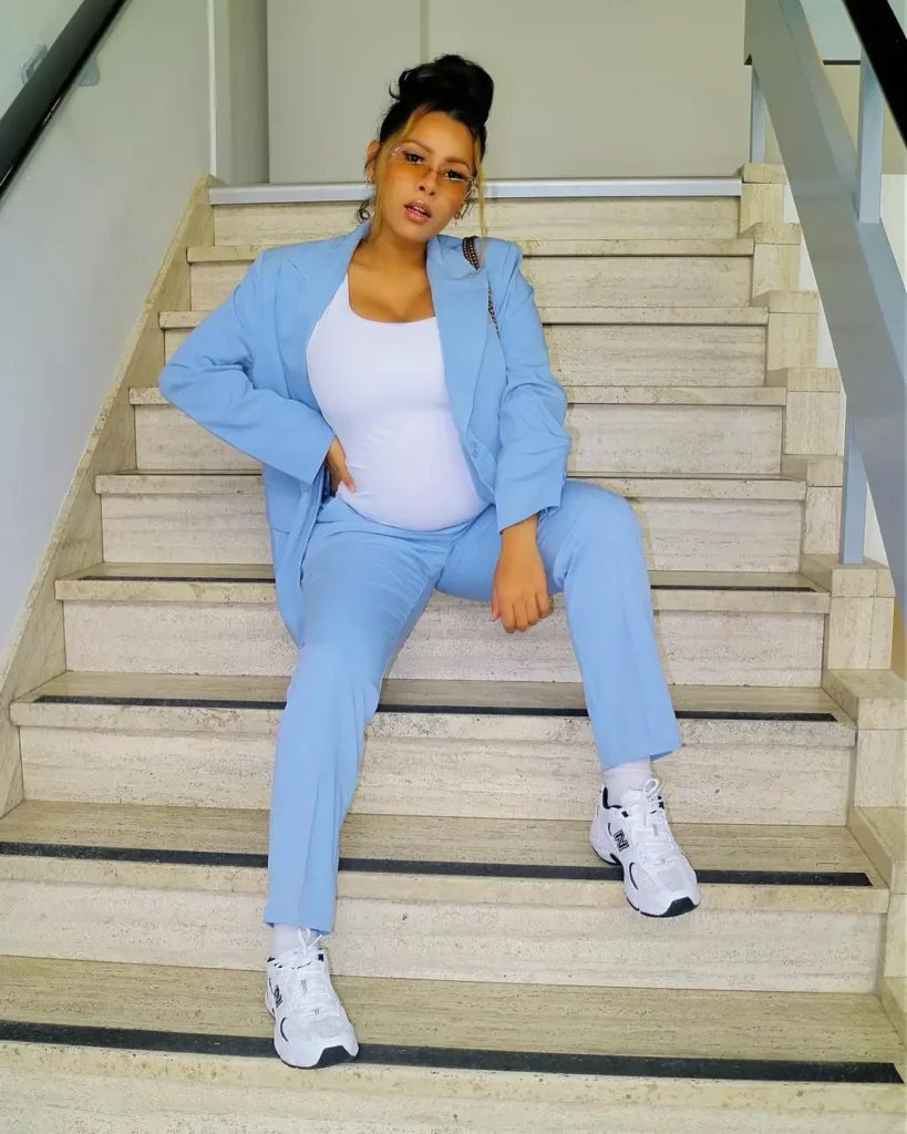 The crisp white New Balance 530 sneakers keep things grounded, functional, and fashion-forward.