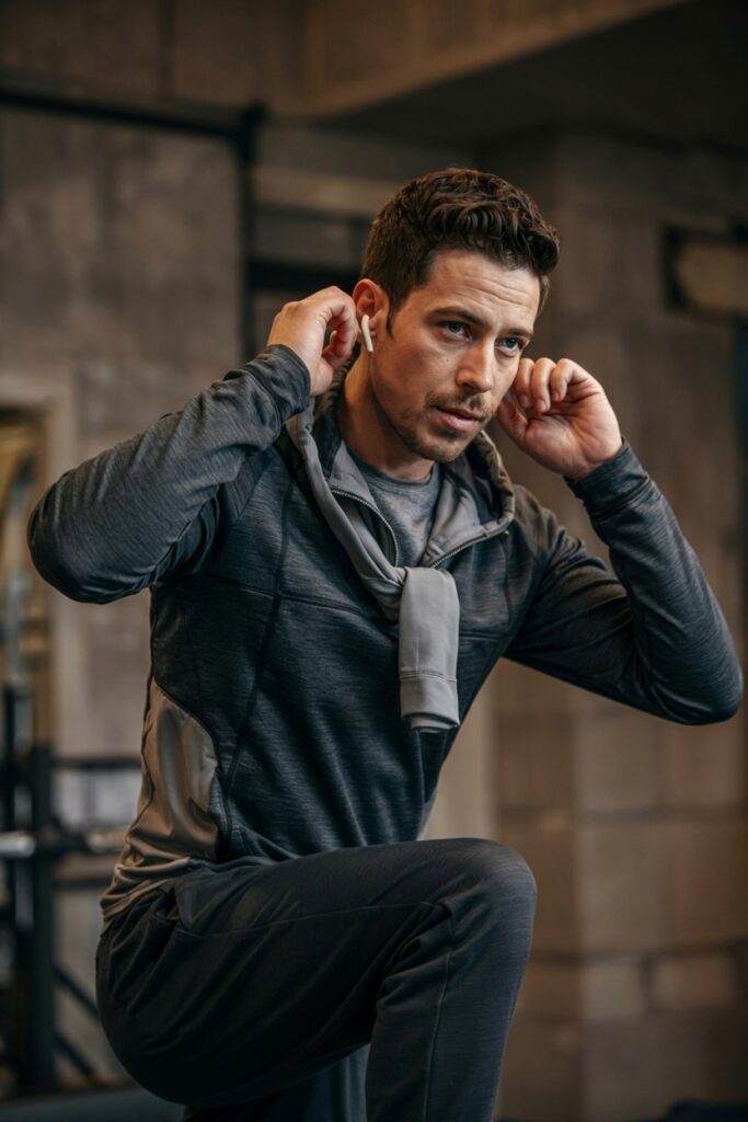 A sporty dad look: black joggers, performance tee, and NB Fresh Foam shoes.