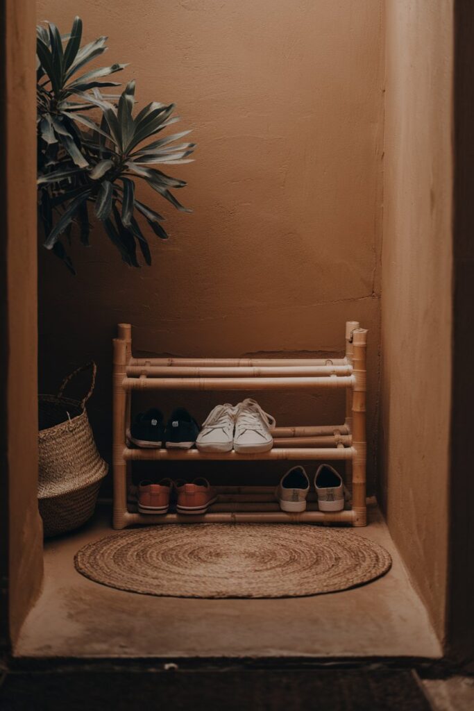 Bamboo Shoe Rack in Narrow Entry by Wooden Door