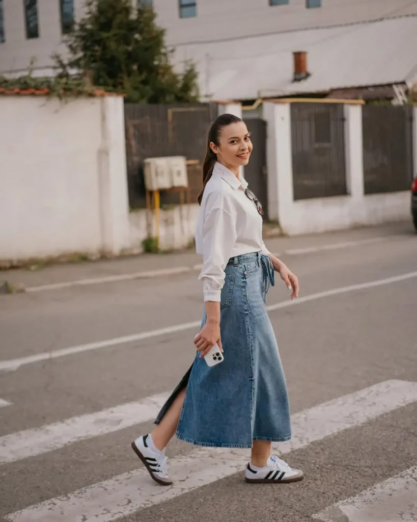 structured denim midi skirt (with jean details like seams and pockets) with a tucked-in white button-up shirt