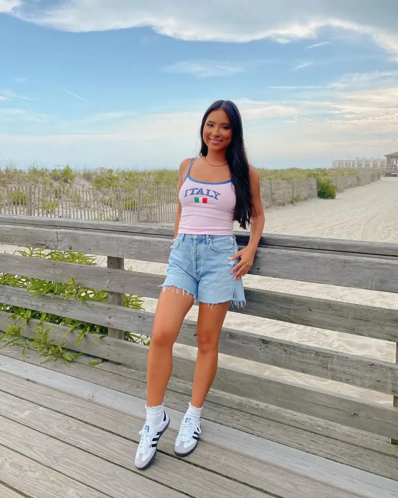 Start with light-wash raw-hem wide-leg jeans, then layer a loose button-down shirt (bonus points for pale blue) under a long trench coat in beige or taupe.