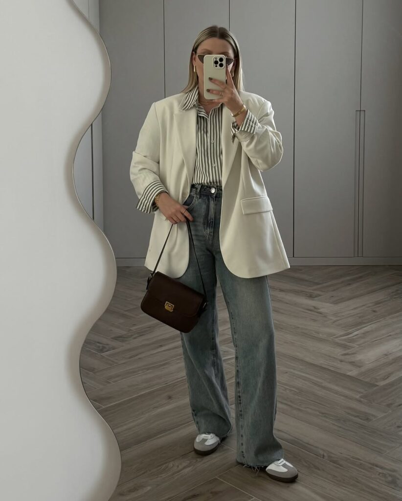 a denim-on-denim set — think a structured denim jacket paired with matching high-waisted jeans.