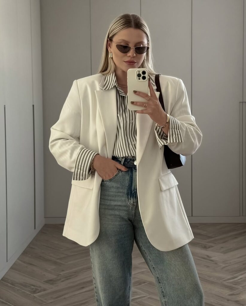 a denim-on-denim set — think a structured denim jacket paired with matching high-waisted jeans.