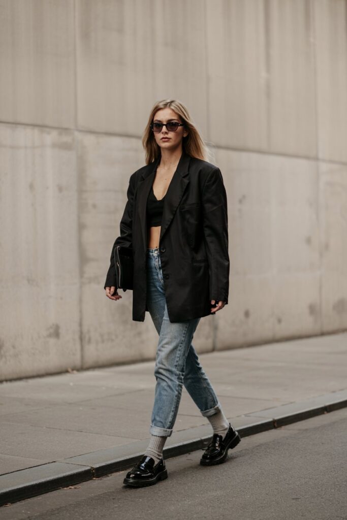 Structured blazer look with chunky loafers and visible socks