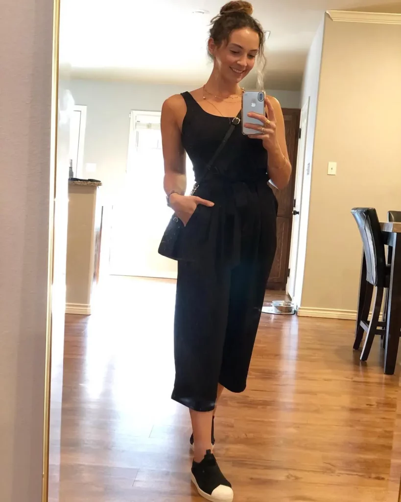 Black Jumpsuit Chic with Adidas Superstars