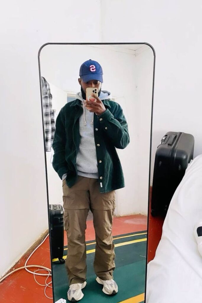 Light grey hoodie + deep green corduroy overshirt + brown cargo pants + white NB 327 + bold blue cap