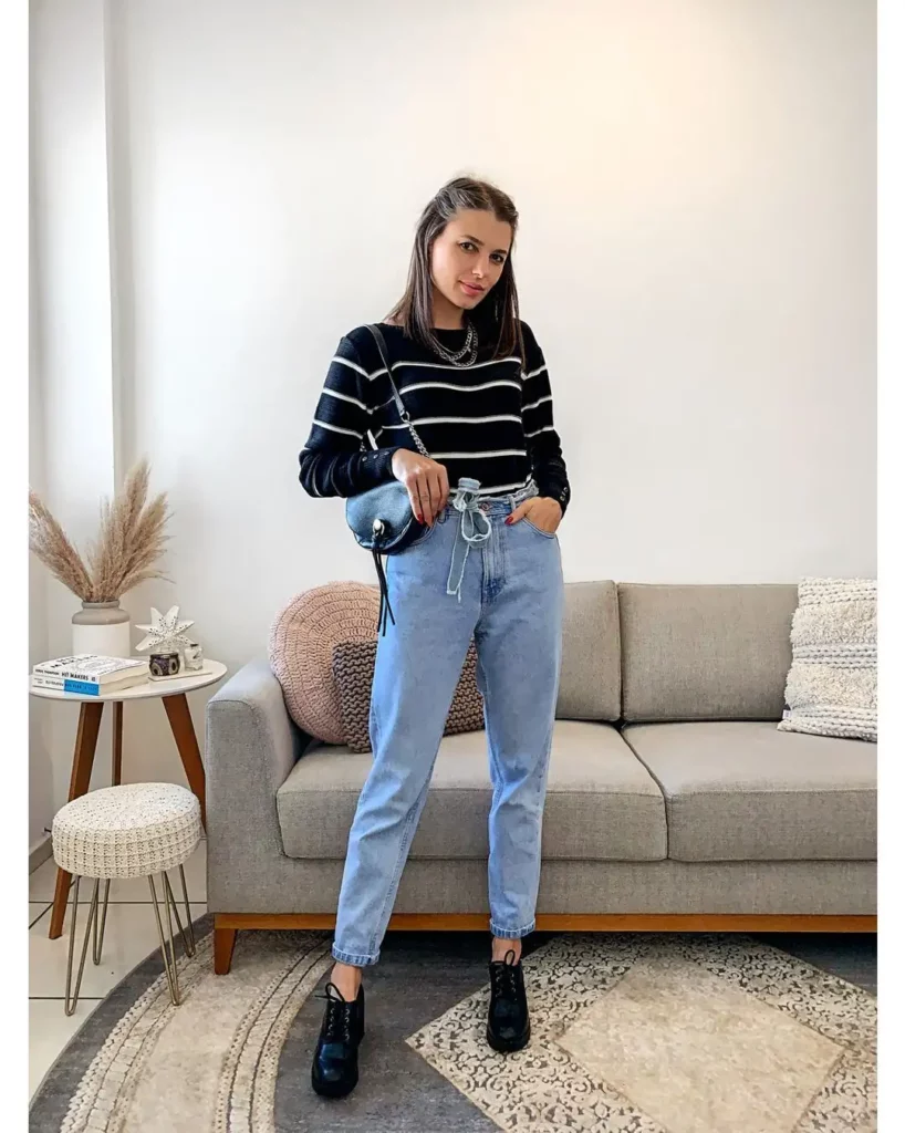 The black and white stripes keep the top sharp yet relaxed, while the light-wash paperbag jeans add a youthful, breathable edge to your workwear rotation