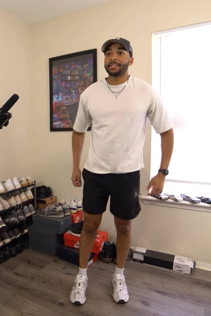 White tee + black athletic shorts + NB 530