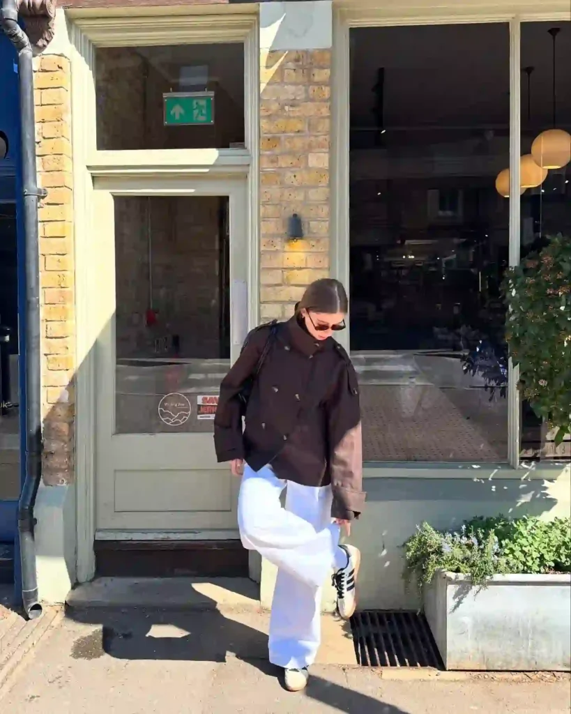 Cropped Brown Jacket with White Wide-Leg Jeans and Adidas Samba