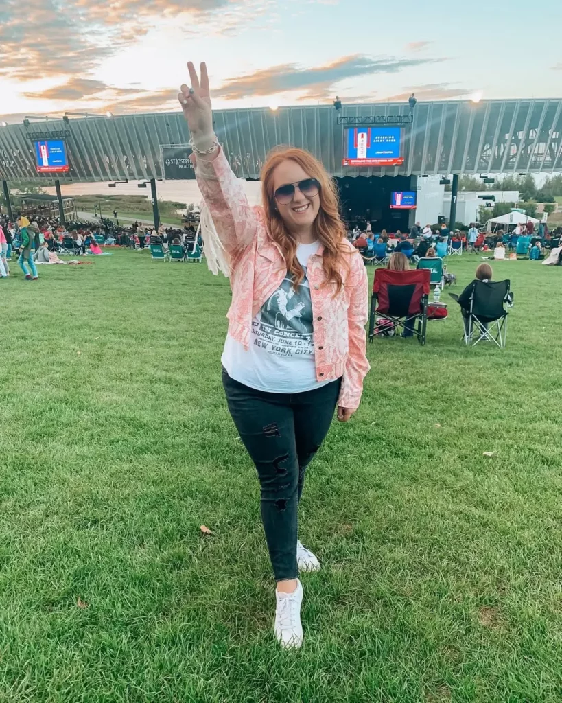 Fringe Jacket + Graphic Tee + White Sneakers