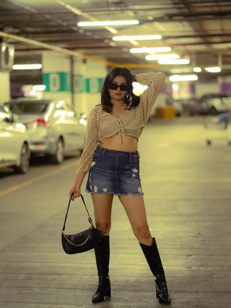 Beige Cropped Knit Top + Distressed Blue Denim Mini Skirt + Black Knee-High Boots