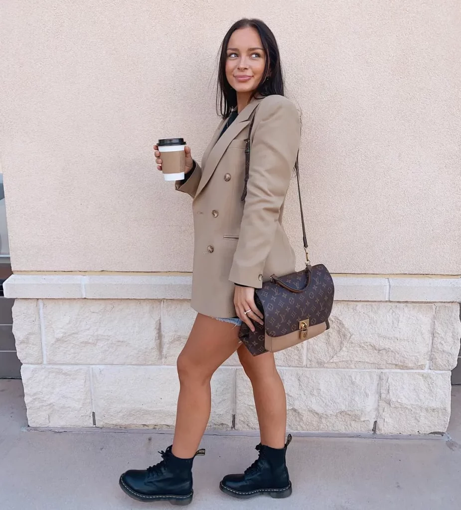 Camel Double-Breasted Blazer + Denim Shorts + Black Combat Ankle Boots