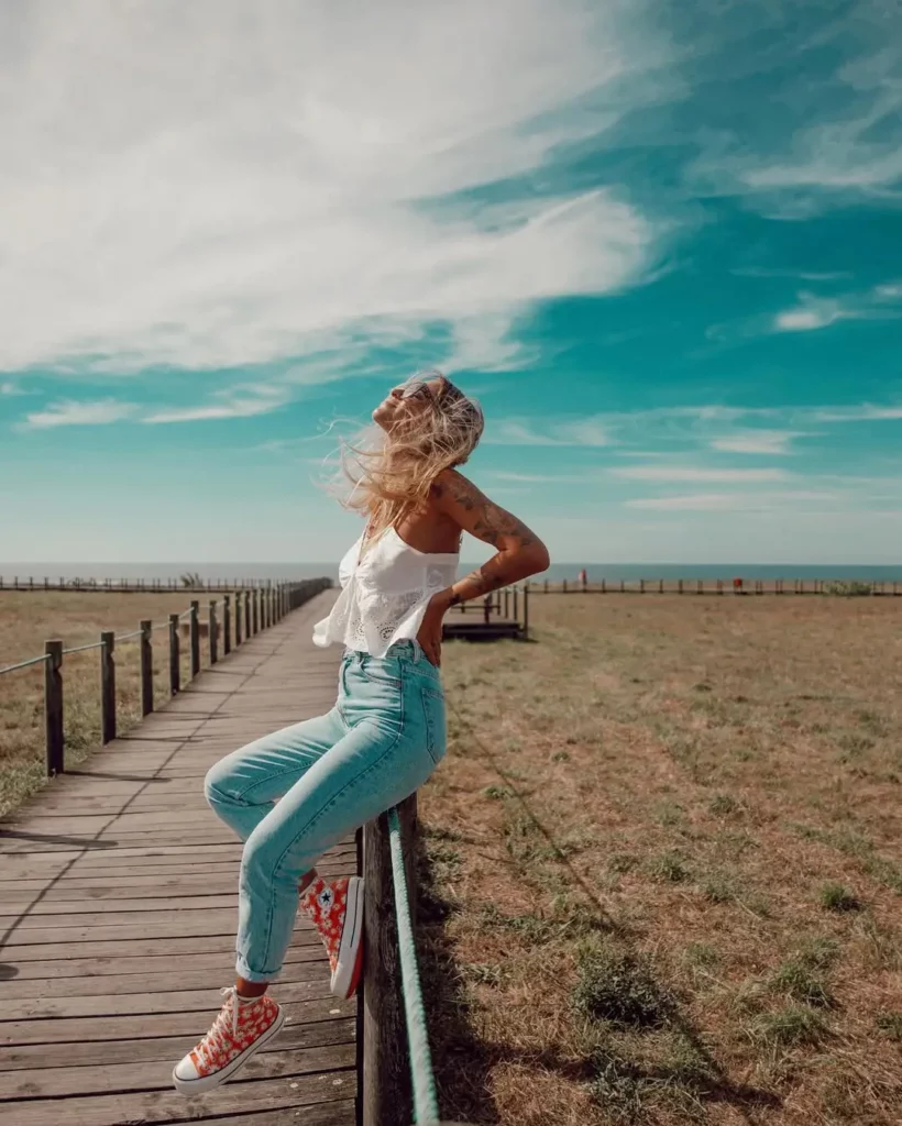 Eyelet Camisole + Light-Wash Skinny Jeans + Printed Converse