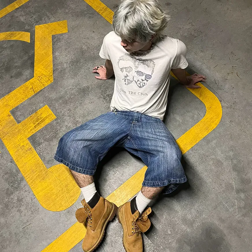 Graphic Tee with Denim Shorts and Timberland Boots