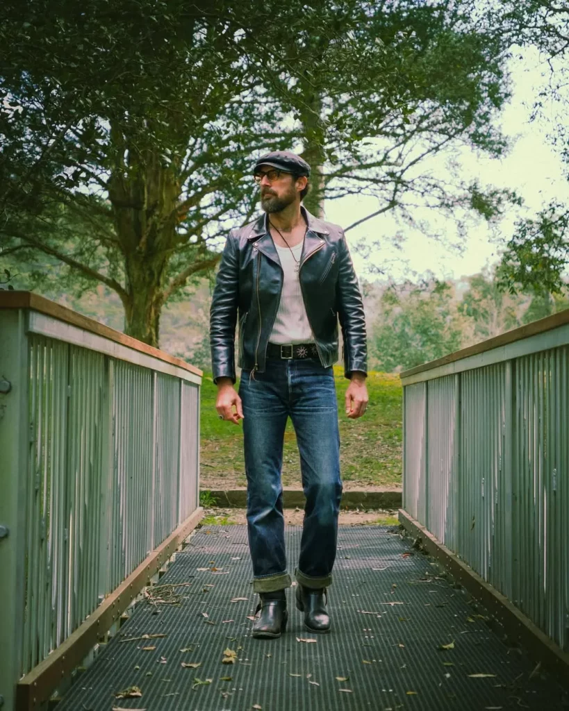 Leather Jacket + Cuffed Jeans + Black Harness Boots
