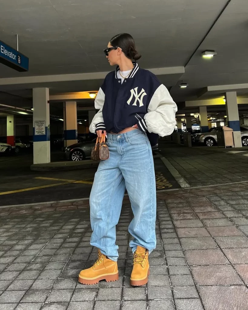 Varsity Jacket + Light Wash Baggy Jeans + Timberland Boots