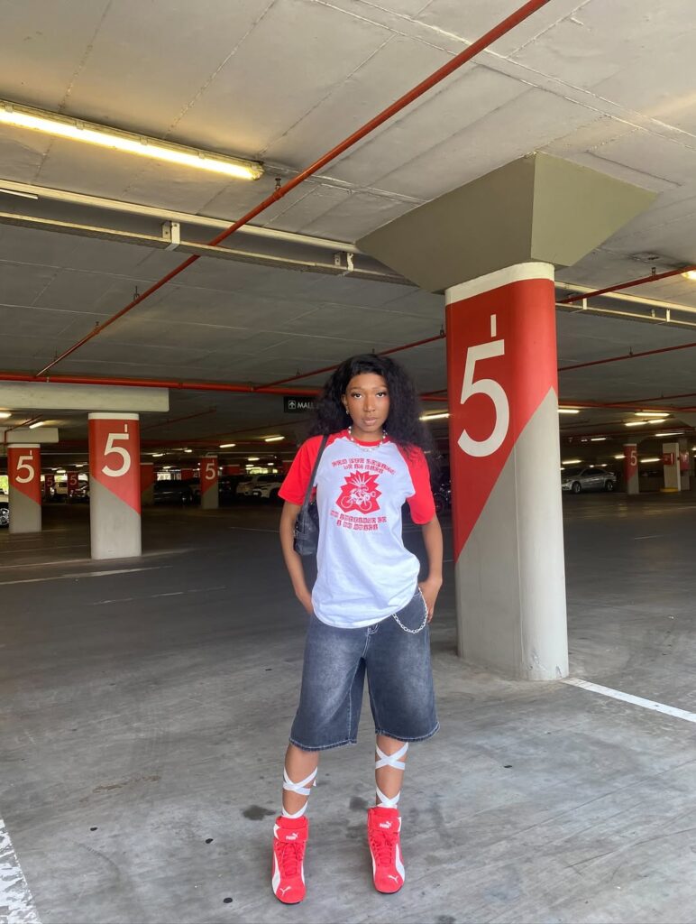 Oversized Street Style with Bold Red Speedcats