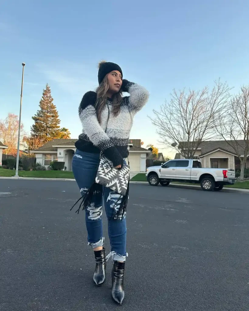 Edgy Winter Street Style with Black Boots and Jeans