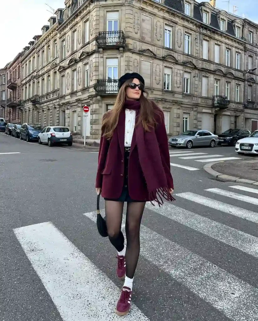 Elegant Street Look with Burgundy Layers and Sneakers