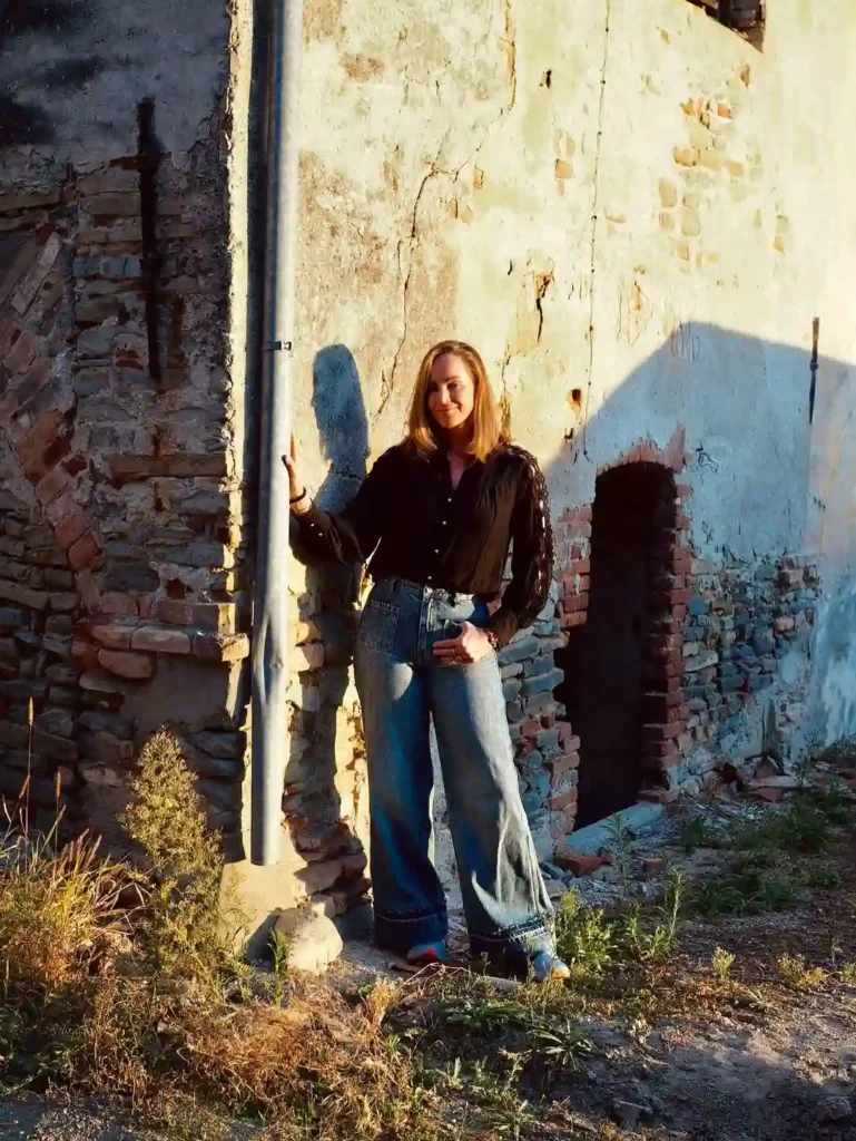 Golden Hour Edge with Wide-Leg Jeans and Sneakers