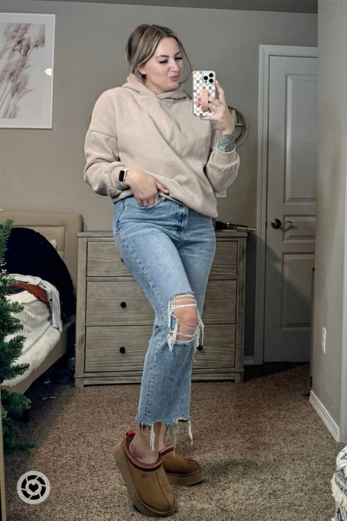 Neutral Sweatshirt with Ripped Jeans and UGGs