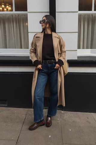 Trench Coat Layering with Wide-Leg Jeans and Loafers