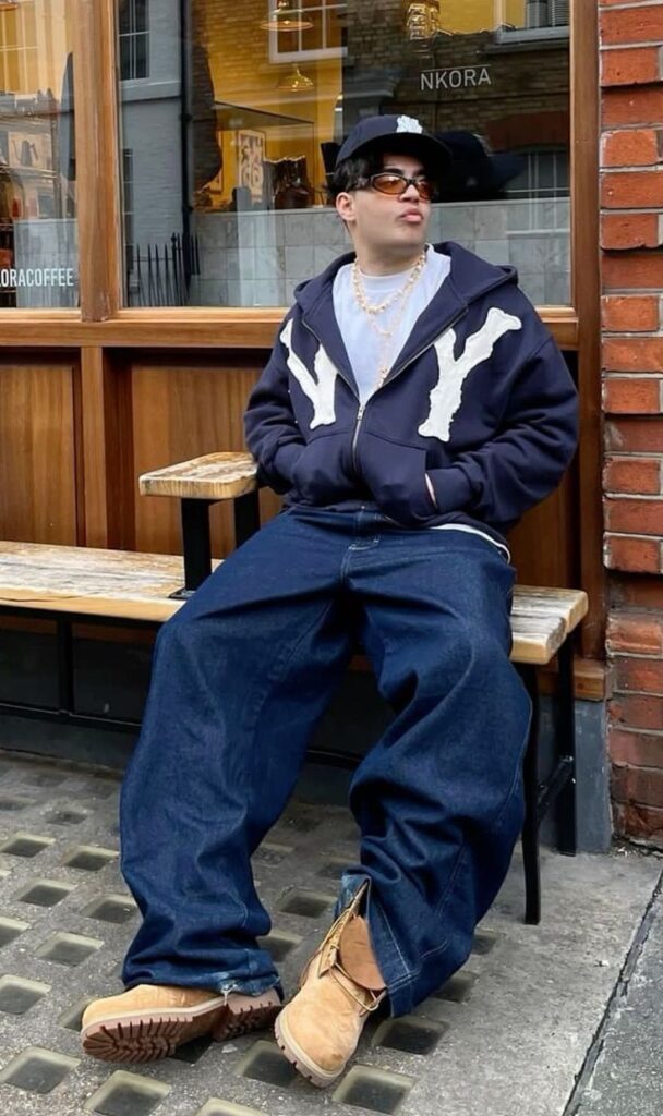 Graphic Hoodie with Dark Baggy Jeans and Tan Boots