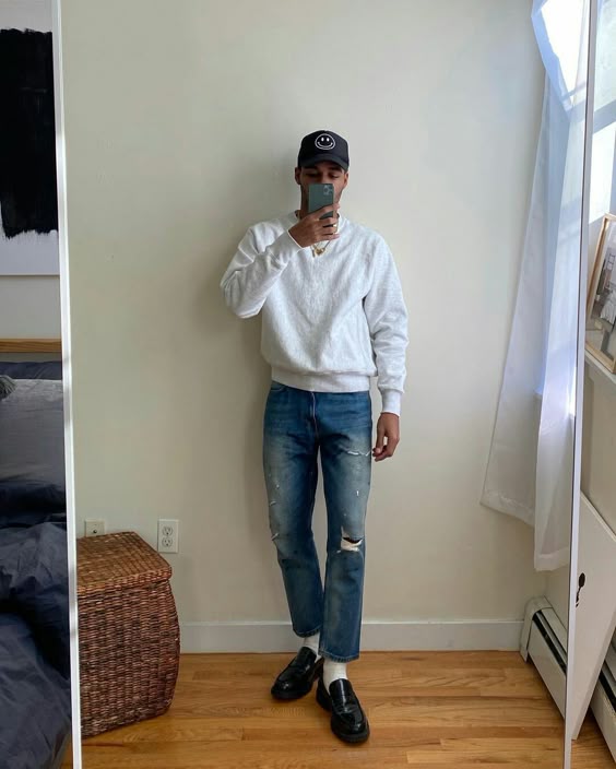 Casual White Sweatshirt with Blue Jeans and Black Loafers