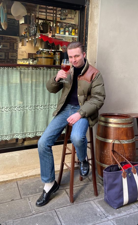 Puffer Jacket with Blue Jeans and Black Loafers