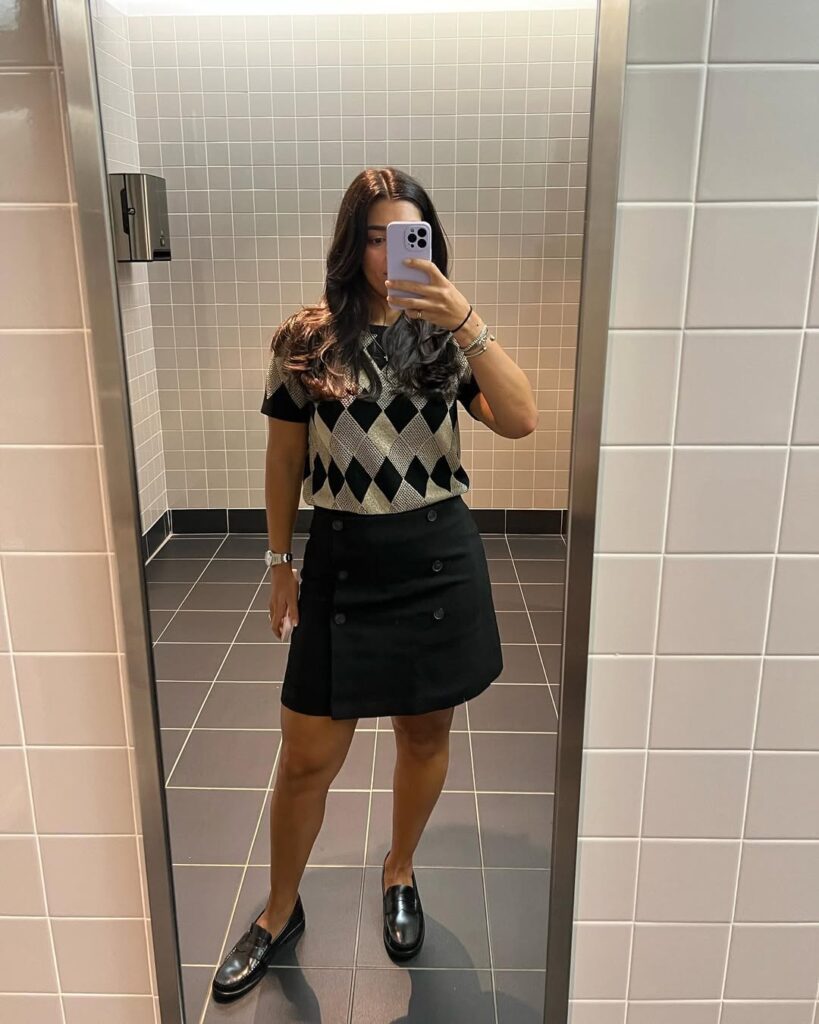 Argyle Knit Top with Black Mini Skirt and Penny Loafers
