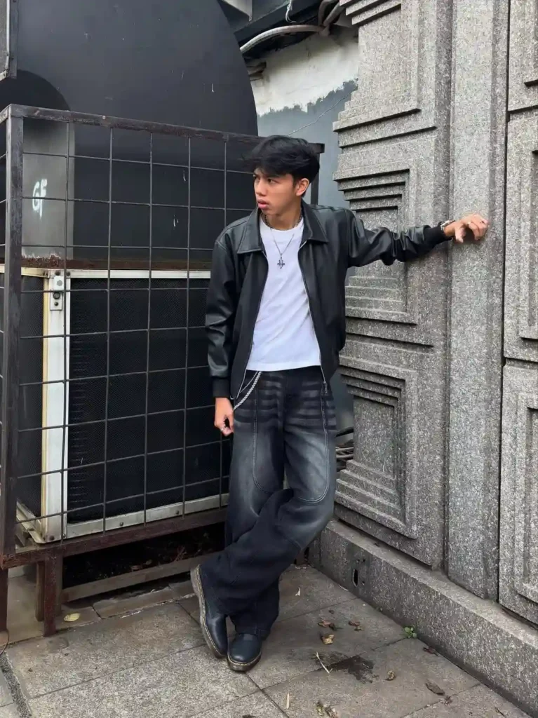 Black Leather Jacket with Dark Baggy Jeans and Boots