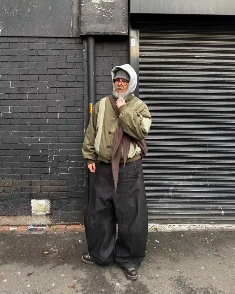 Oversized Bomber Jacket with Wide Baggy Jeans and Leather Boots