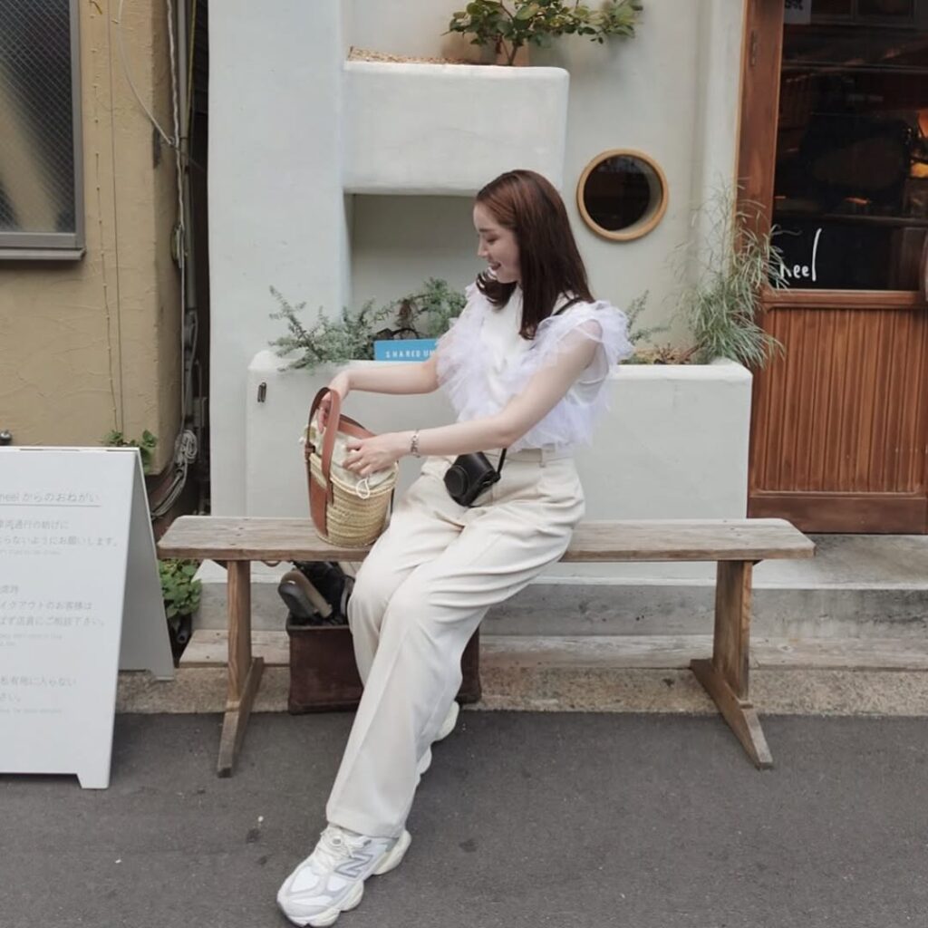 Ruffle White Blouse and Cream Trousers with New Balance 9060
