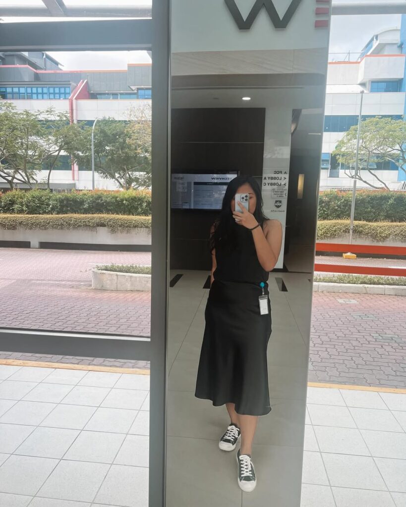 Minimal All-Black Satin Skirt with Sneakers Outfit