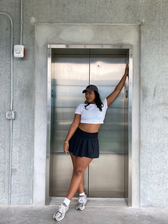 Black Tennis Skirt with Cropped Tee and New Balance 530