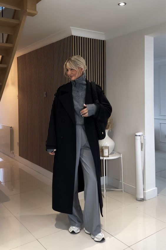 Long Black Coat and Tailored Trousers with New Balance 9060