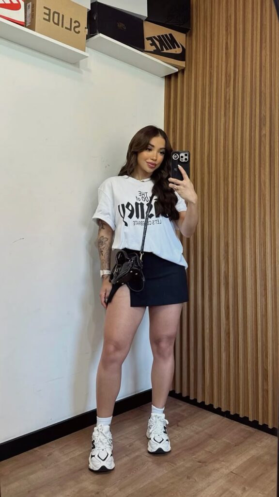 Graphic Tee and Black Mini Skirt with New Balance 9060