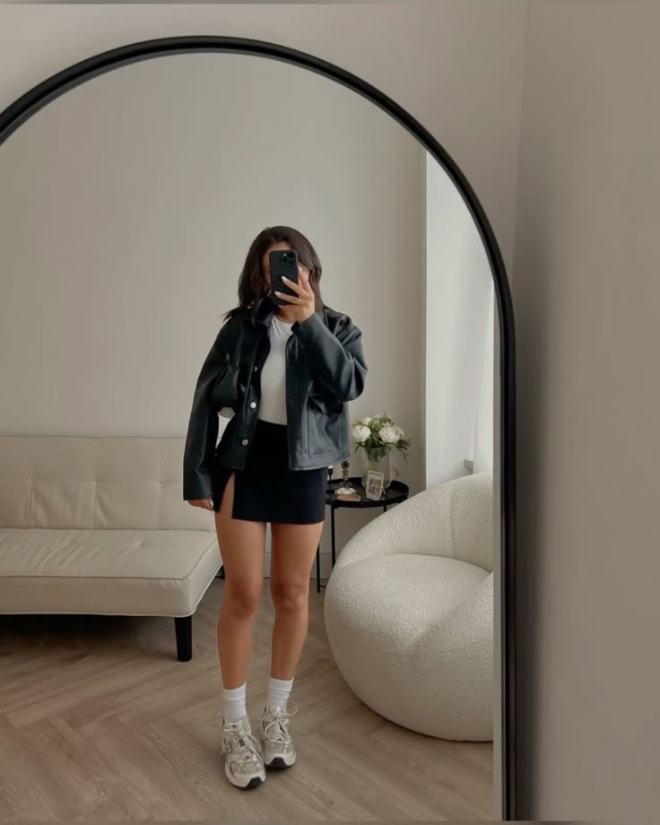 Black Mini Skirt with Leather Jacket and New Balance 530