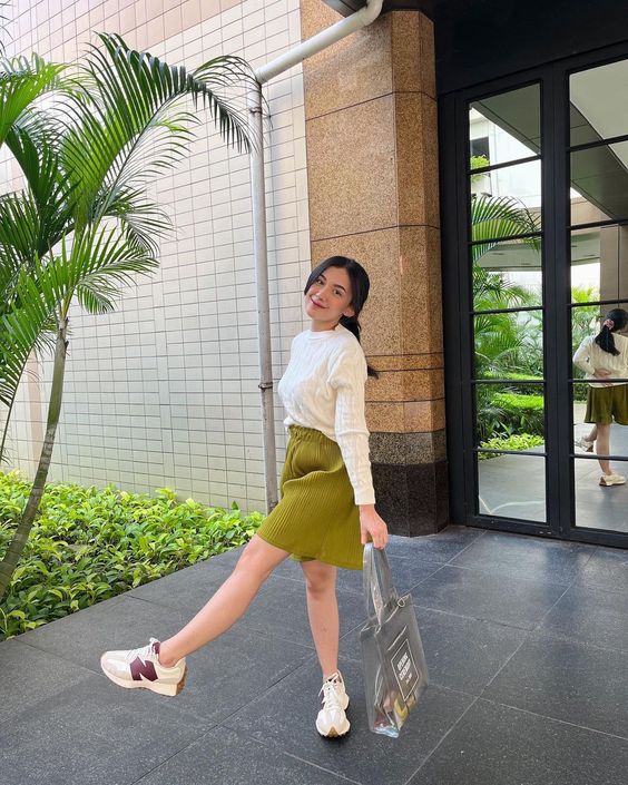White Sweater with Pleated Mini Skirt and New Balance 327 Outfit