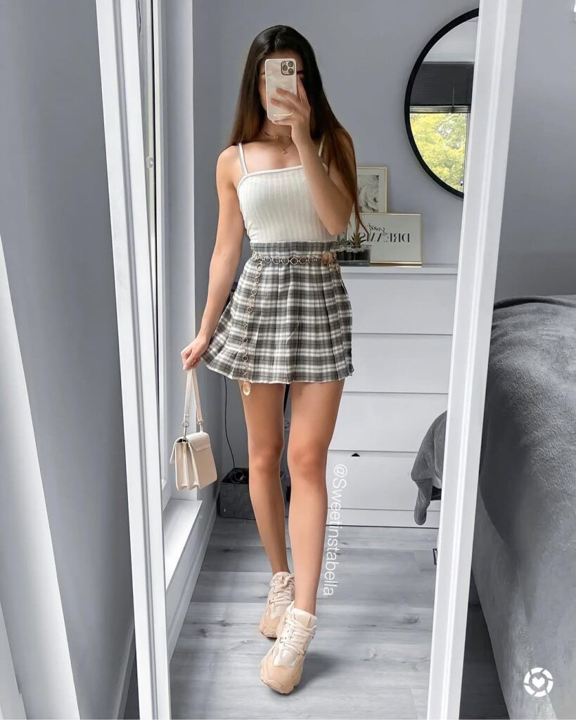 Plaid Pleated Skirt with Ribbed Tank Top and Sneakers Outfit