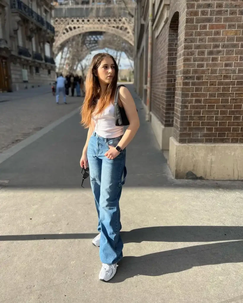 White Tank Top with Straight-Leg Jeans and New Balance 530