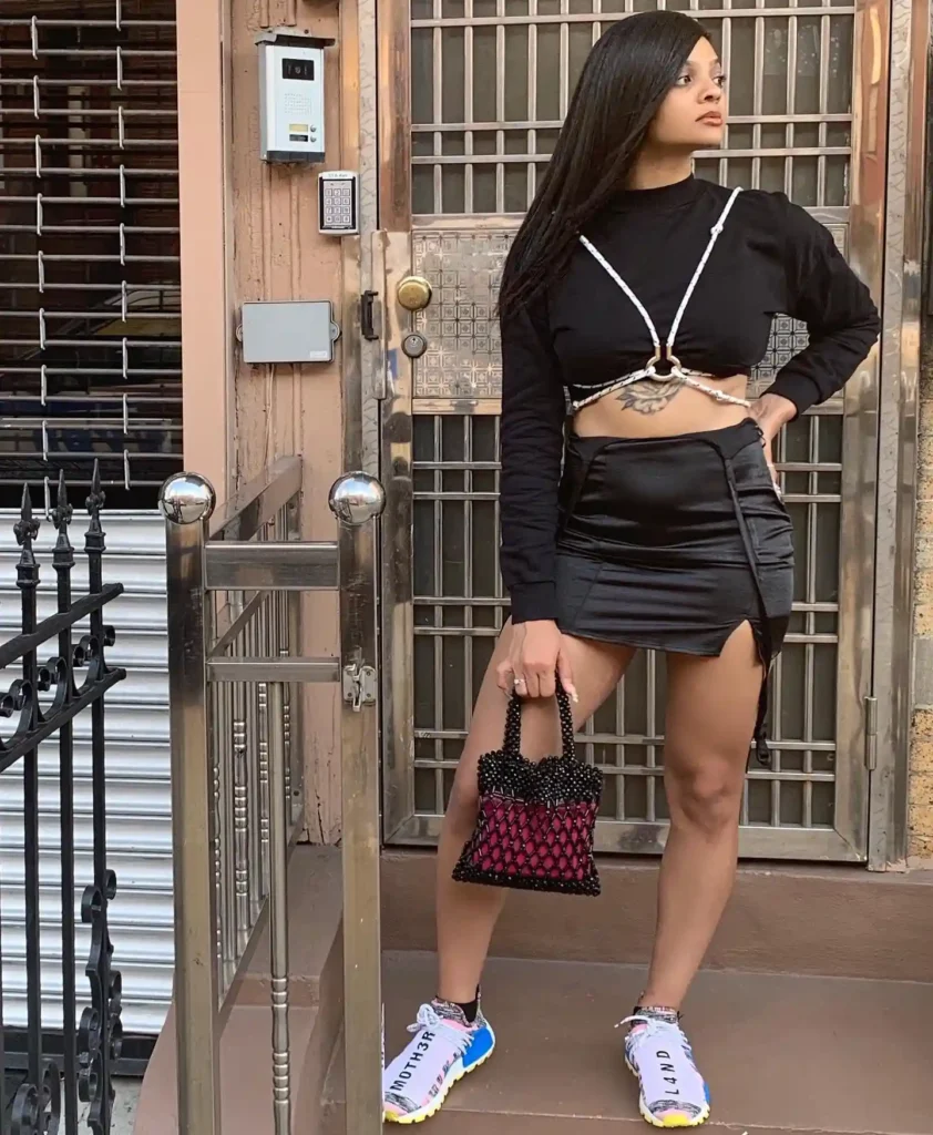Cropped Black Top with Satin Skirt and Sneakers