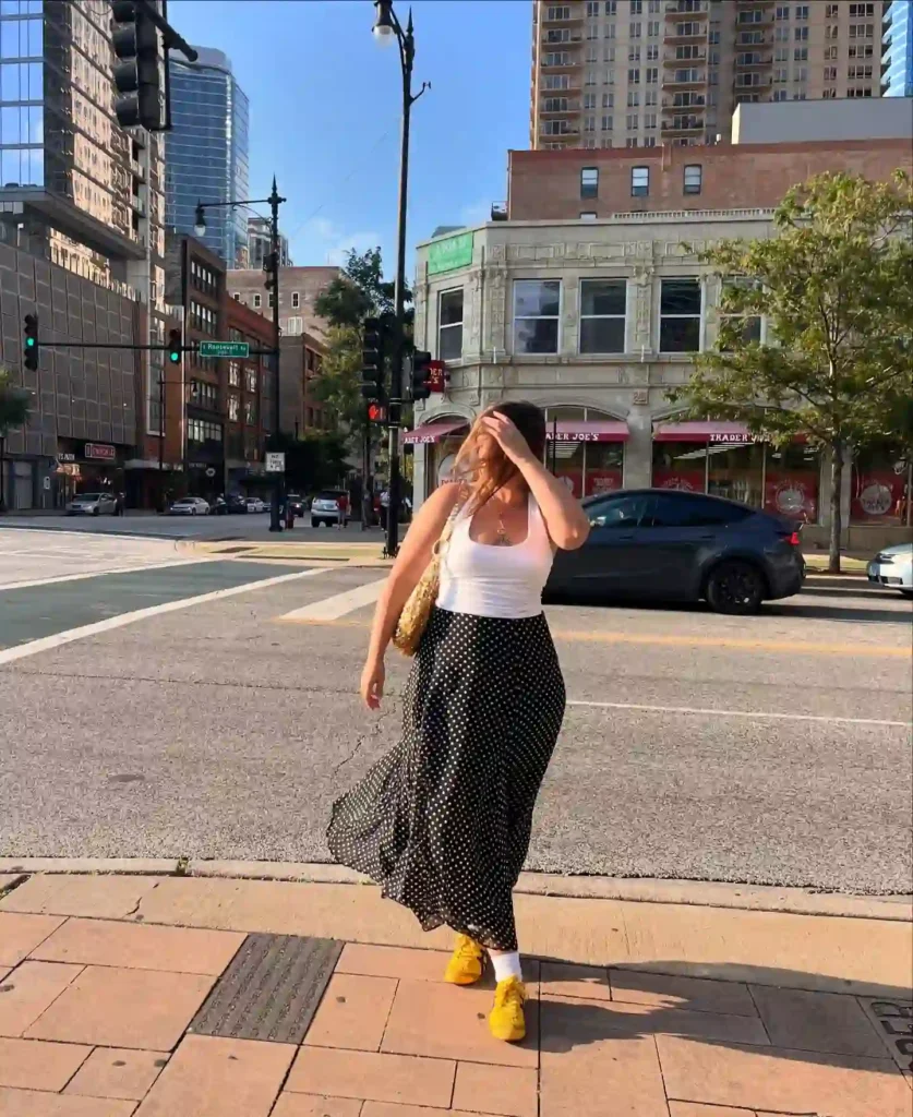 White Tank Top with Polka Dot Midi Skirt and Sneakers Outfit