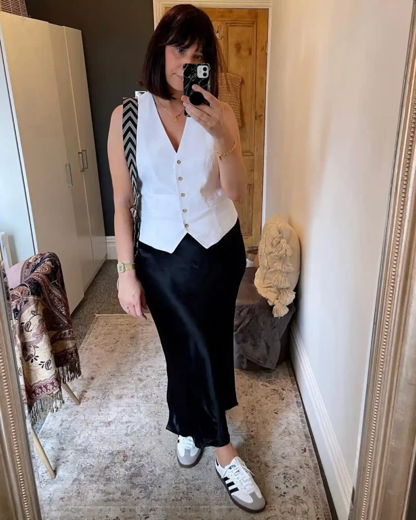 White Vest Top with Black Satin Skirt and Sneakers