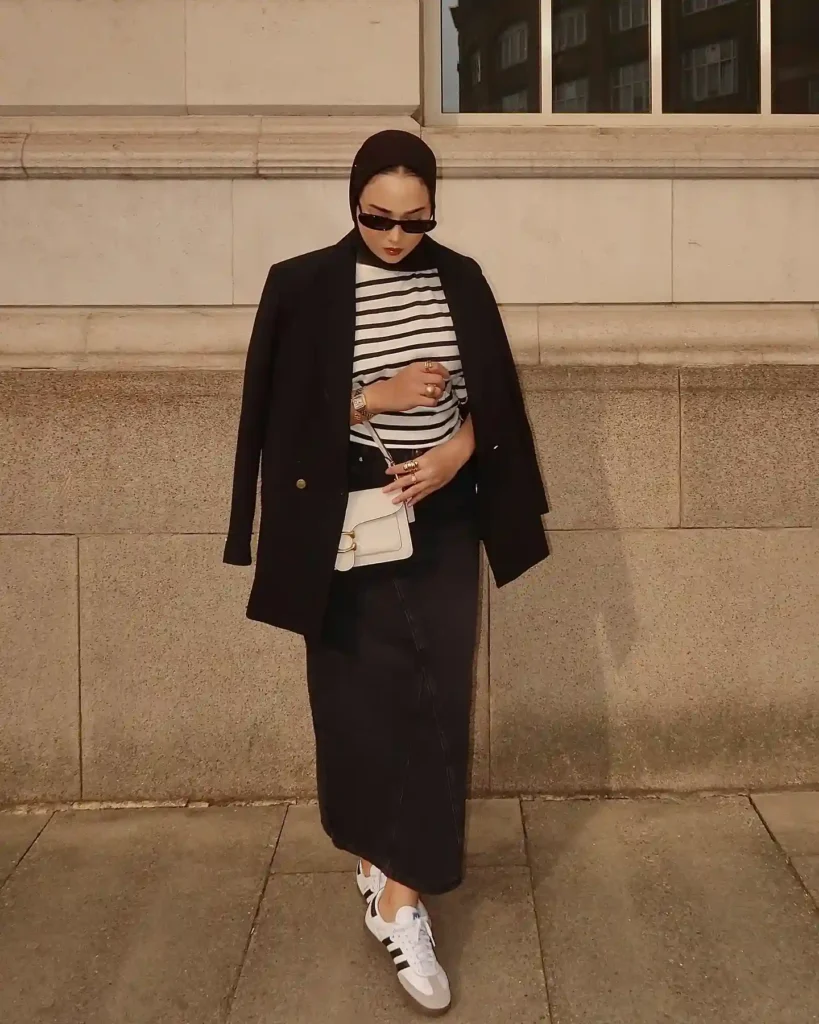 Striped Top with Black Denim Maxi Skirt and Sneakers