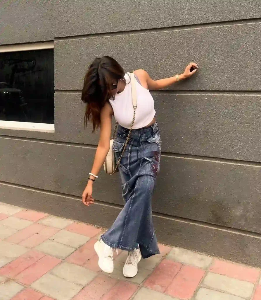 White Sleeveless Top with Denim Midi Skirt and Sneakers Outfit