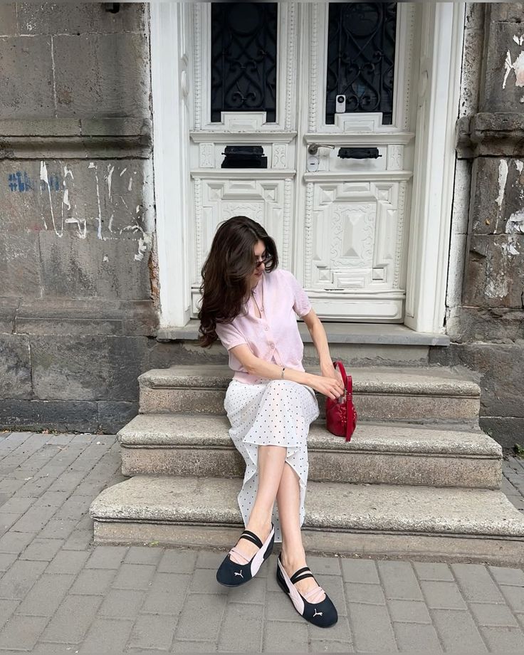 Soft Pink Top with Polka Dot Skirt and Black Puma Ballet Flats Outfit