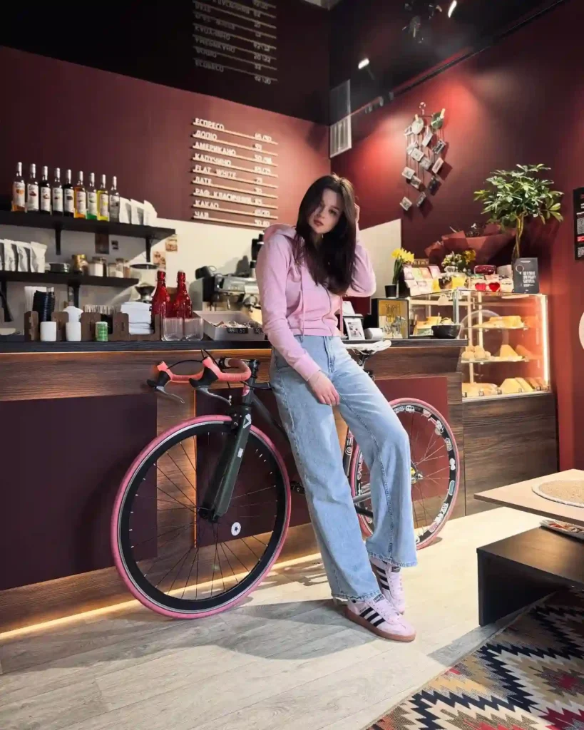Pink Hoodie with Light Wash Jeans and Adidas Handball Spezial